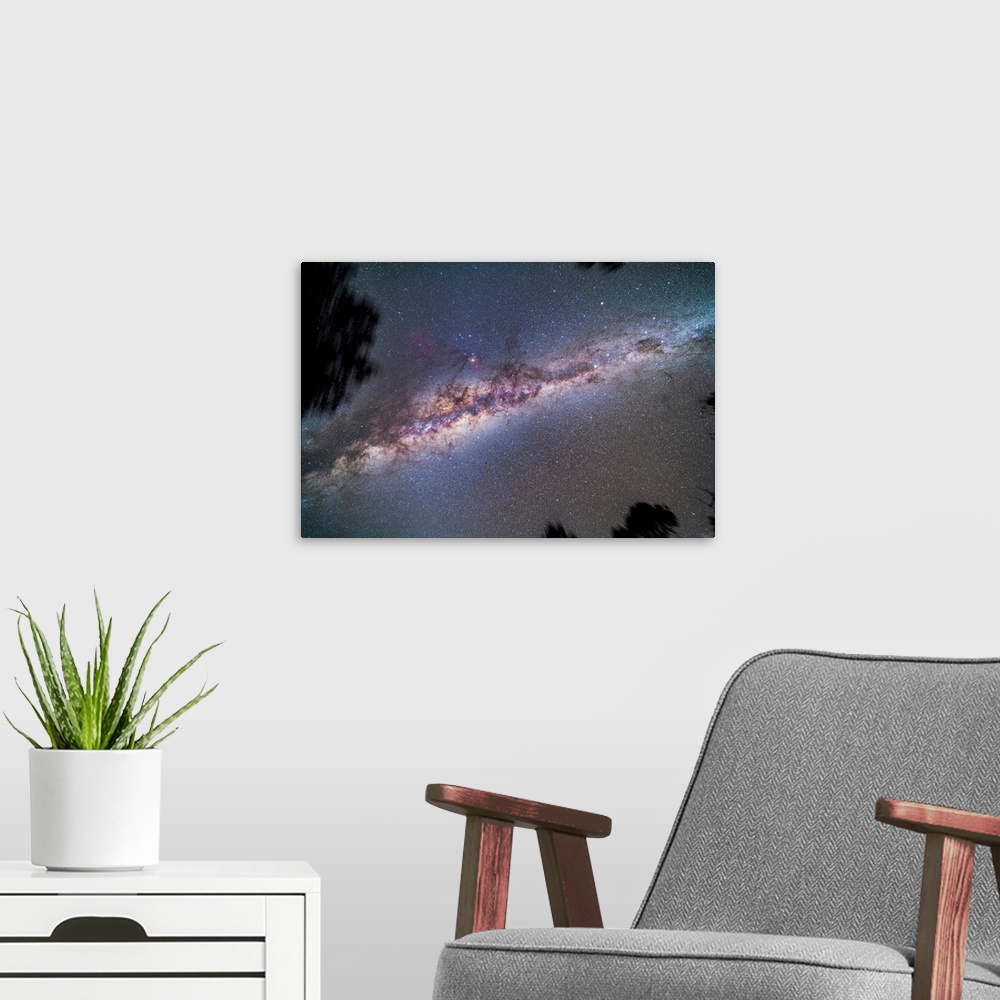 A modern room featuring A view looking up to the zenith at the centre of the Milky Way galaxy.