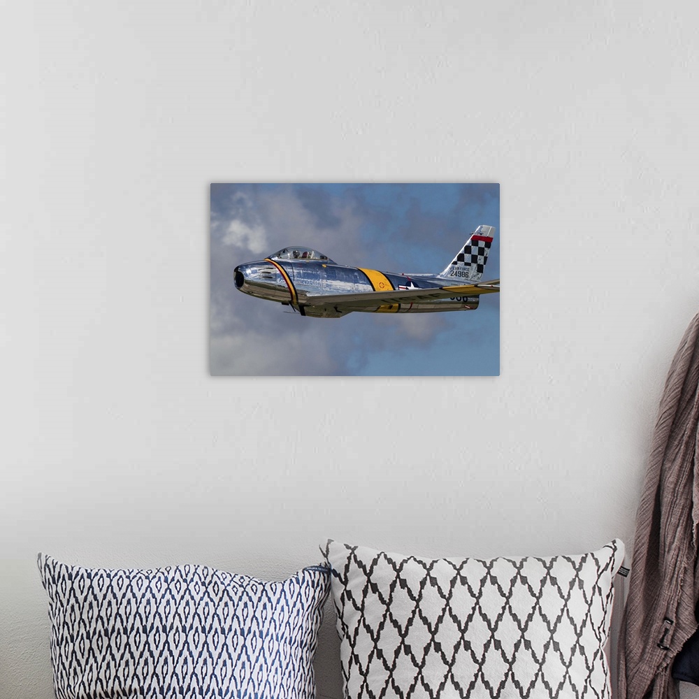 A bohemian room featuring A vintage F-86 Sabre of the Warbird Heritage Foundation takes off from Waukegan, Illinois.