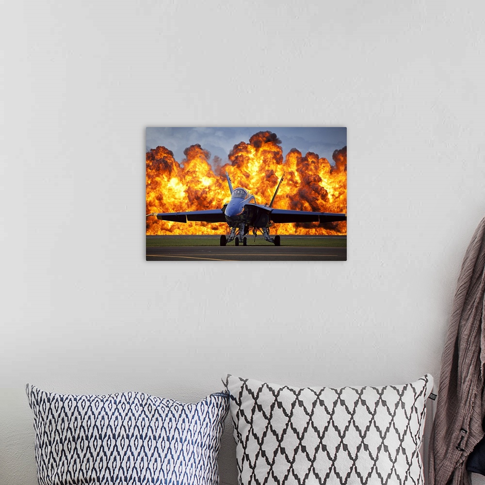 A bohemian room featuring September 28, 2012 - A wall of fire erupts behind a U.S. Navy F/A-18 Hornet aircraft with the Blu...