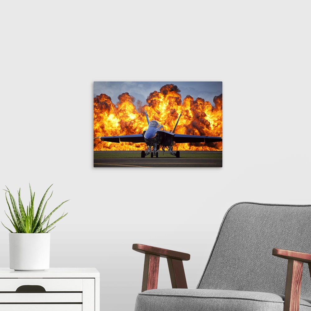 A modern room featuring September 28, 2012 - A wall of fire erupts behind a U.S. Navy F/A-18 Hornet aircraft with the Blu...
