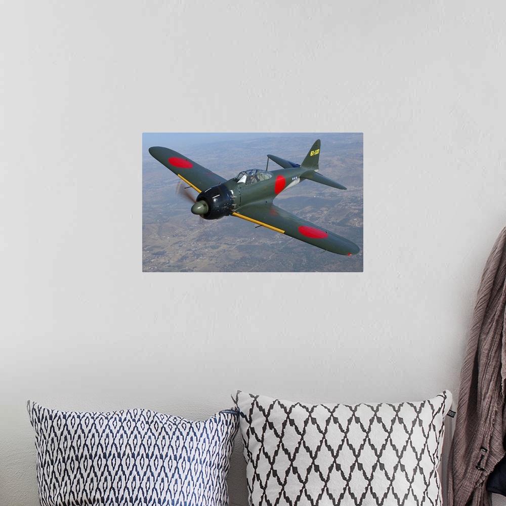 A bohemian room featuring A6M Japaneese Zero flying over Chino, California.