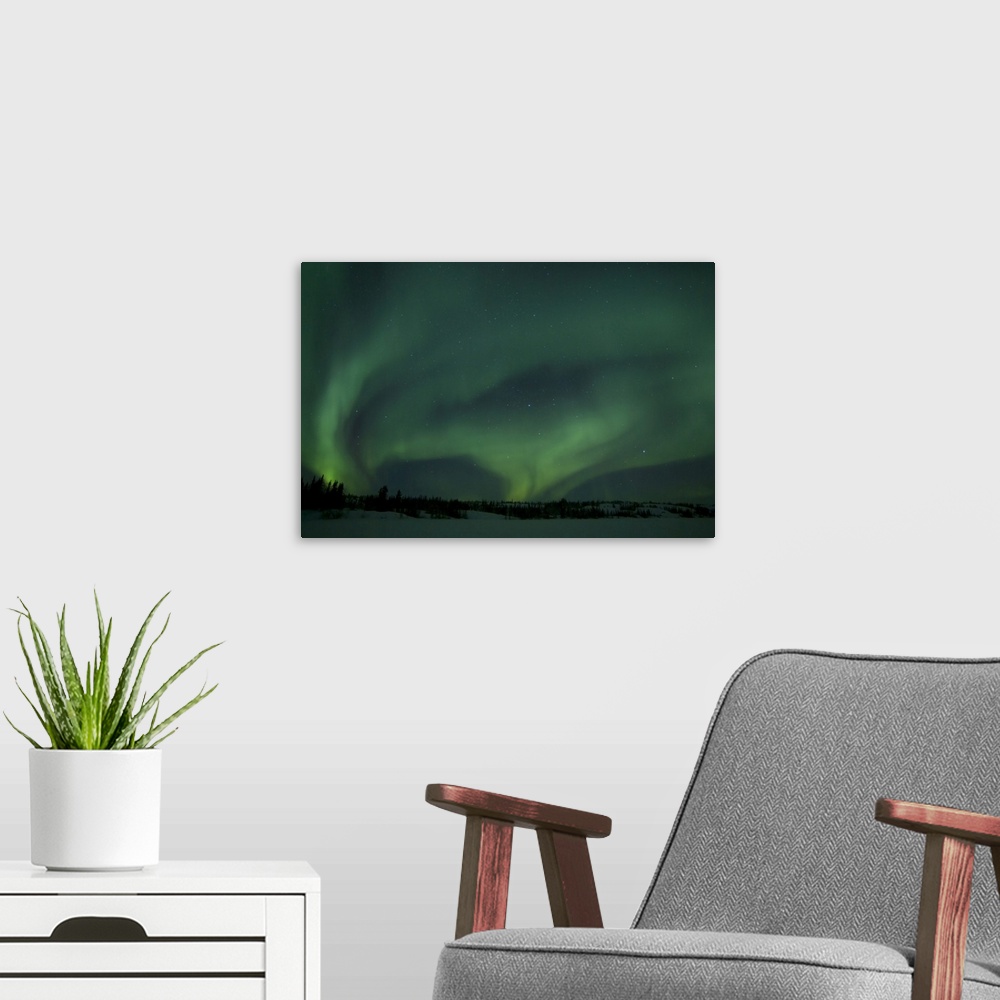 A modern room featuring Active Aurora over Vee Lake Yellowknife Northwest Territories Canada