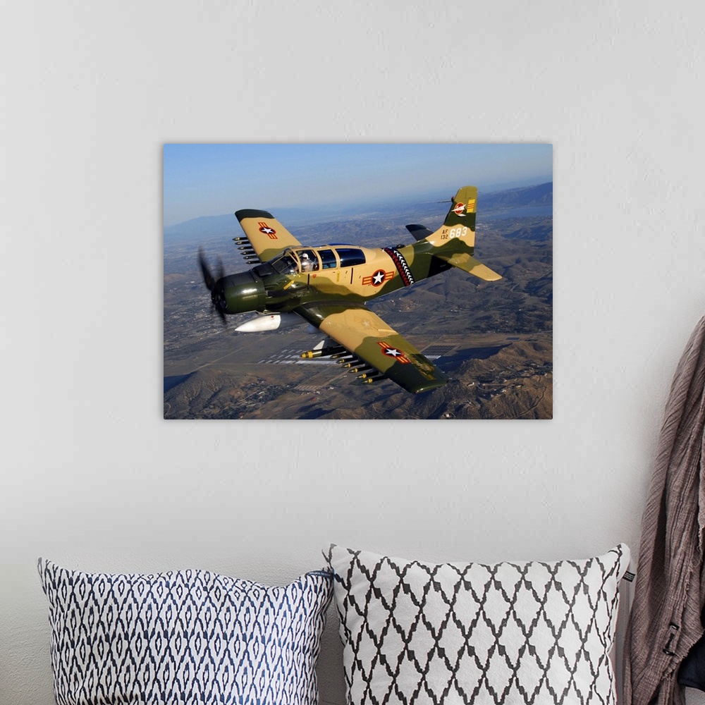 A bohemian room featuring AD-5 Skyraider flying over Chino, California.