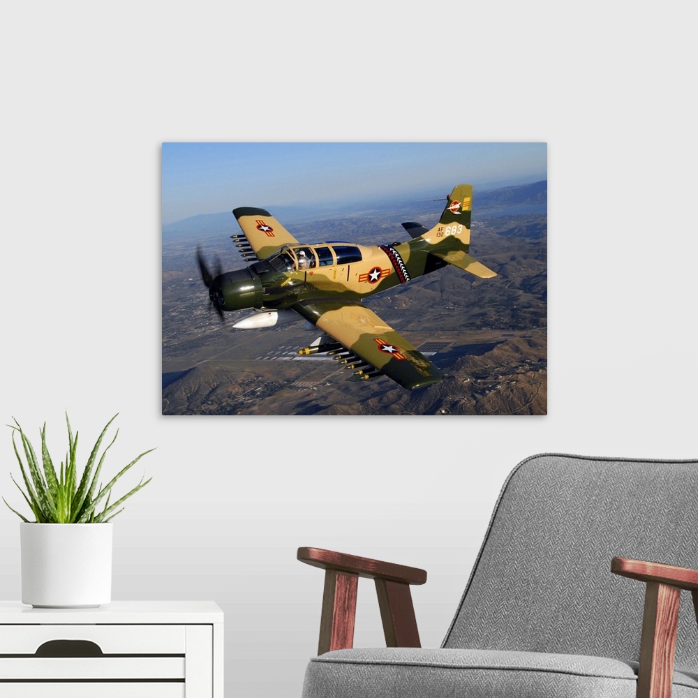 A modern room featuring AD-5 Skyraider flying over Chino, California.