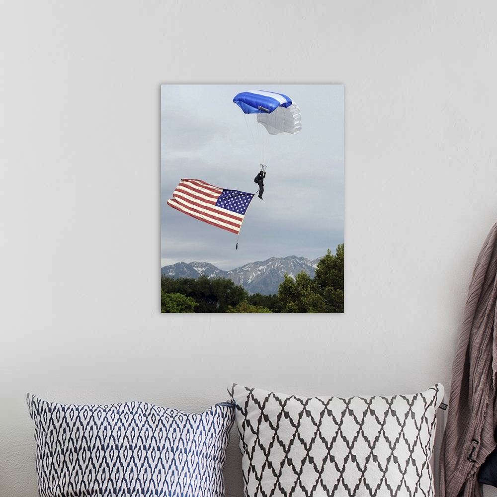 A bohemian room featuring Airman floats through the sky carrying the American flag.