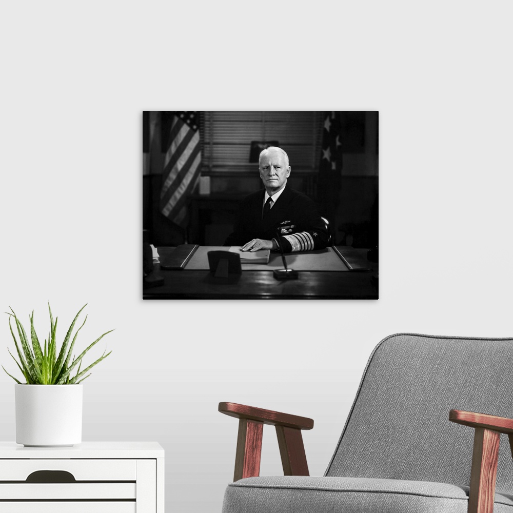A modern room featuring American history photo of Admiral Chester William Nimitz.