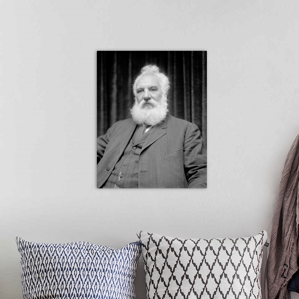 A bohemian room featuring American history portrait of Alexander Graham Bell.