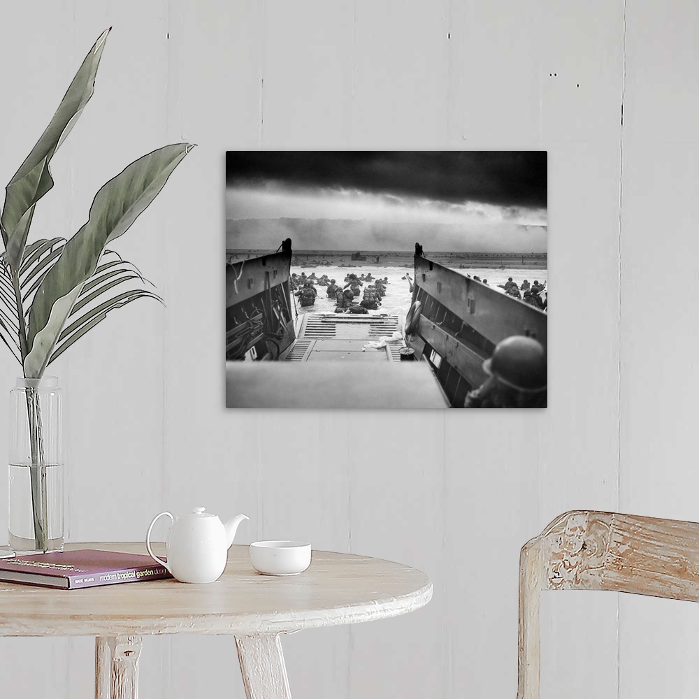 A farmhouse room featuring Digitally restored vintage World War II photo of American troops wading ashore on Omaha Beach dur...