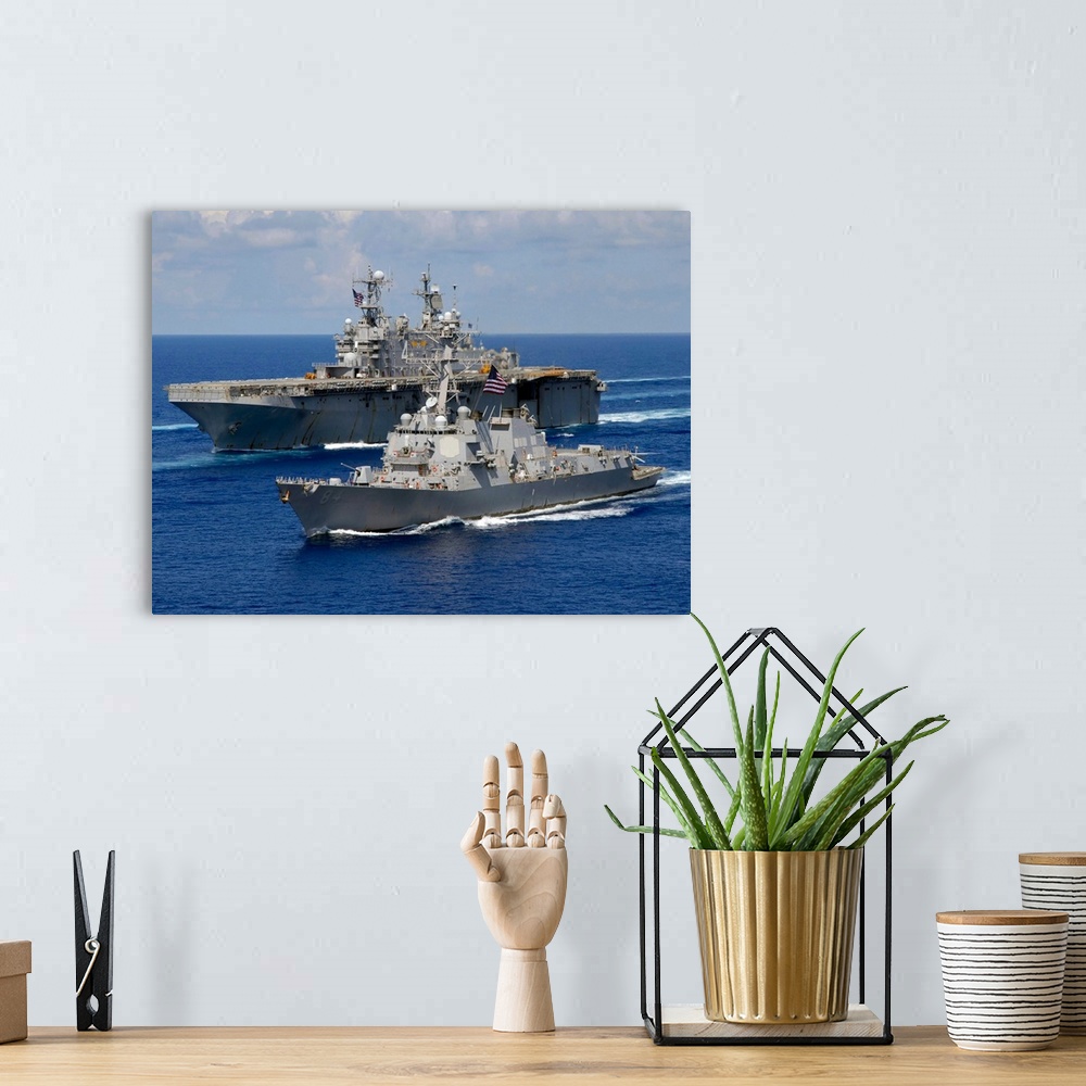 A bohemian room featuring Amphibious assault ship USS Nassau and guided missile destroyer USS Bulkeley transit the Atlantic...