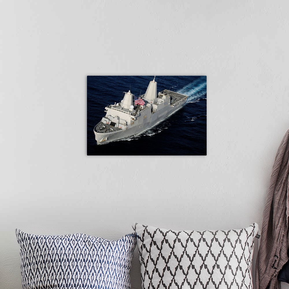 A bohemian room featuring Amphibious transport dock ship USS San Antonio transiting the Gulf of Aden.
