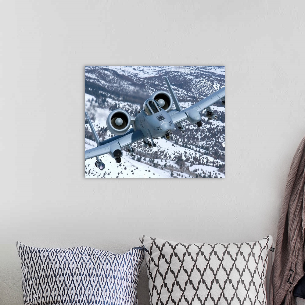 A bohemian room featuring An A-10C Thunderbolt from the 190th Fighter Squadron flies over the snowy Idaho countryside on a ...