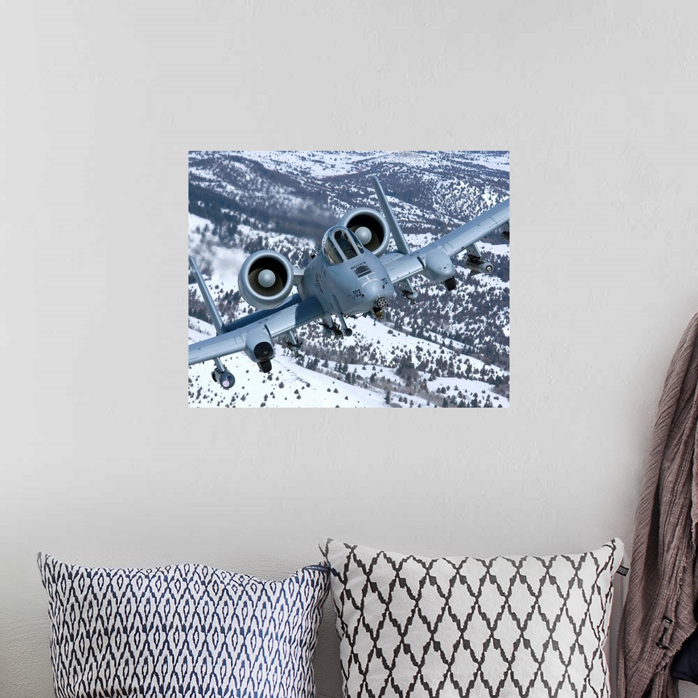 A bohemian room featuring An A-10C Thunderbolt from the 190th Fighter Squadron flies over the snowy Idaho countryside on a ...