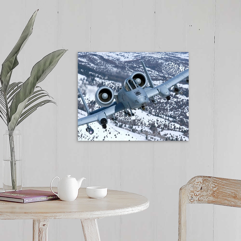 A farmhouse room featuring An A-10C Thunderbolt from the 190th Fighter Squadron flies over the snowy Idaho countryside on a ...
