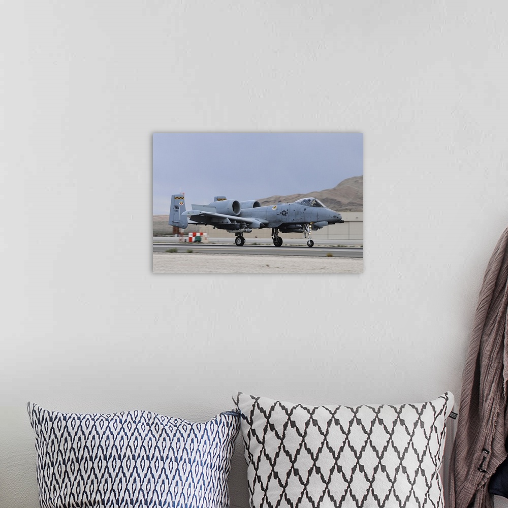 A bohemian room featuring An A-10C Thunderbolt II landing at Nellis Air Force Base, Nevada.