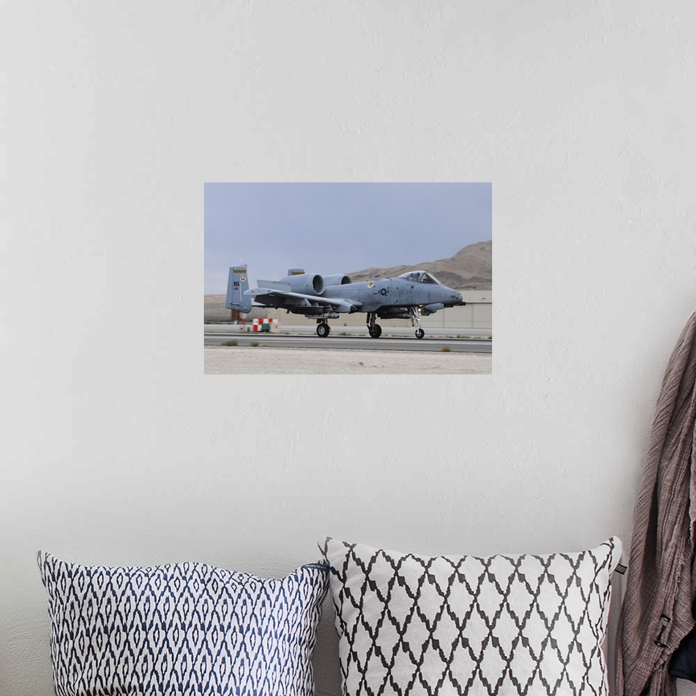 A bohemian room featuring An A-10C Thunderbolt II landing at Nellis Air Force Base, Nevada.