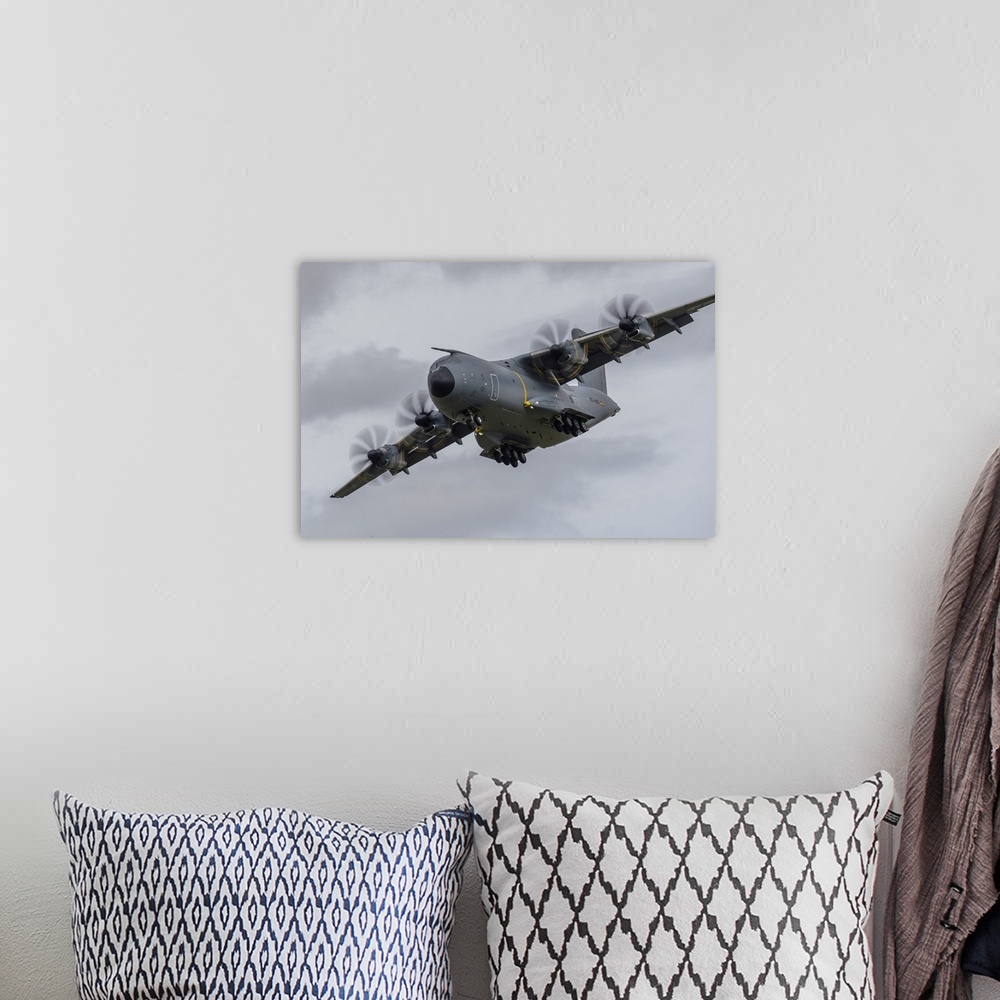 A bohemian room featuring An A400M Atlas turns on to final approach at RAF Fairford in the United Kingdom.