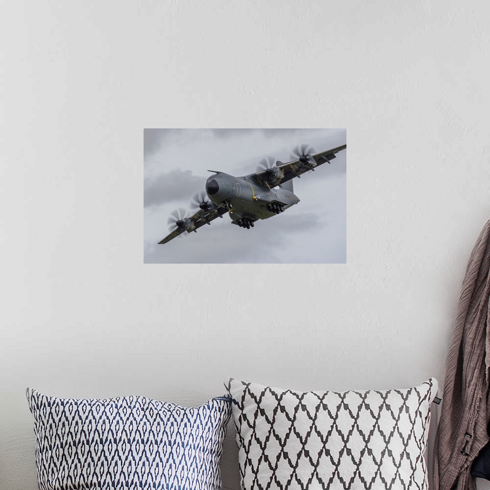 A bohemian room featuring An A400M Atlas turns on to final approach at RAF Fairford in the United Kingdom.