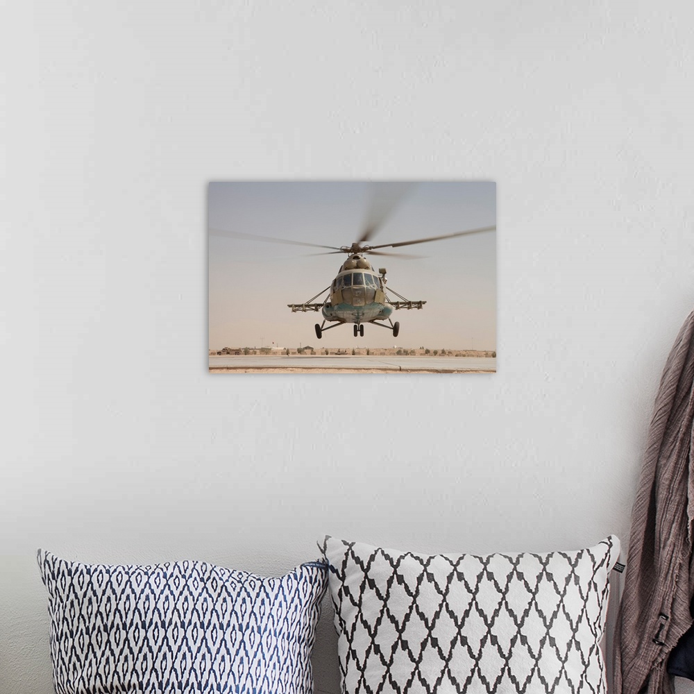 A bohemian room featuring An Afghan Air Force Russian Mil MI-17 helicopter takes off from Camp Shorabak, Afghanistan.
