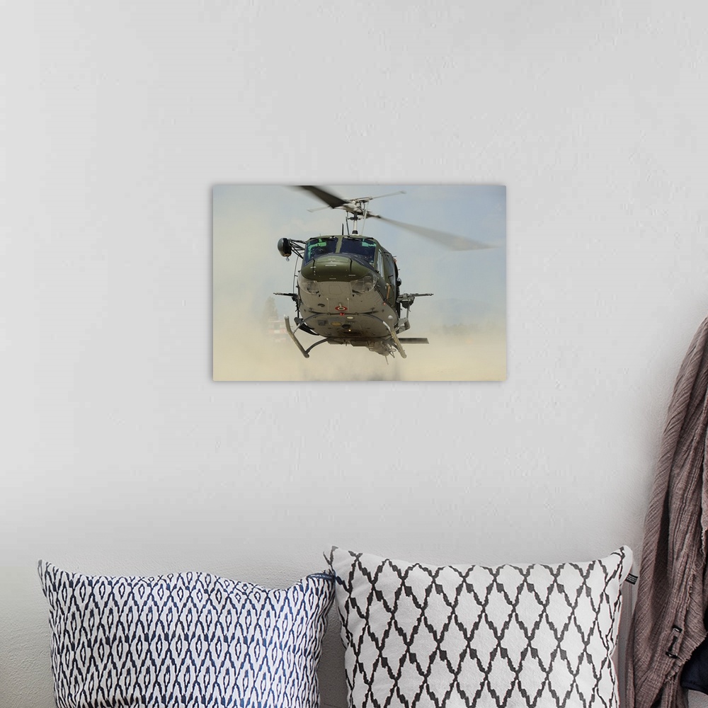 A bohemian room featuring An Agusta Bell AB 212 of the Italian Air Force landing.