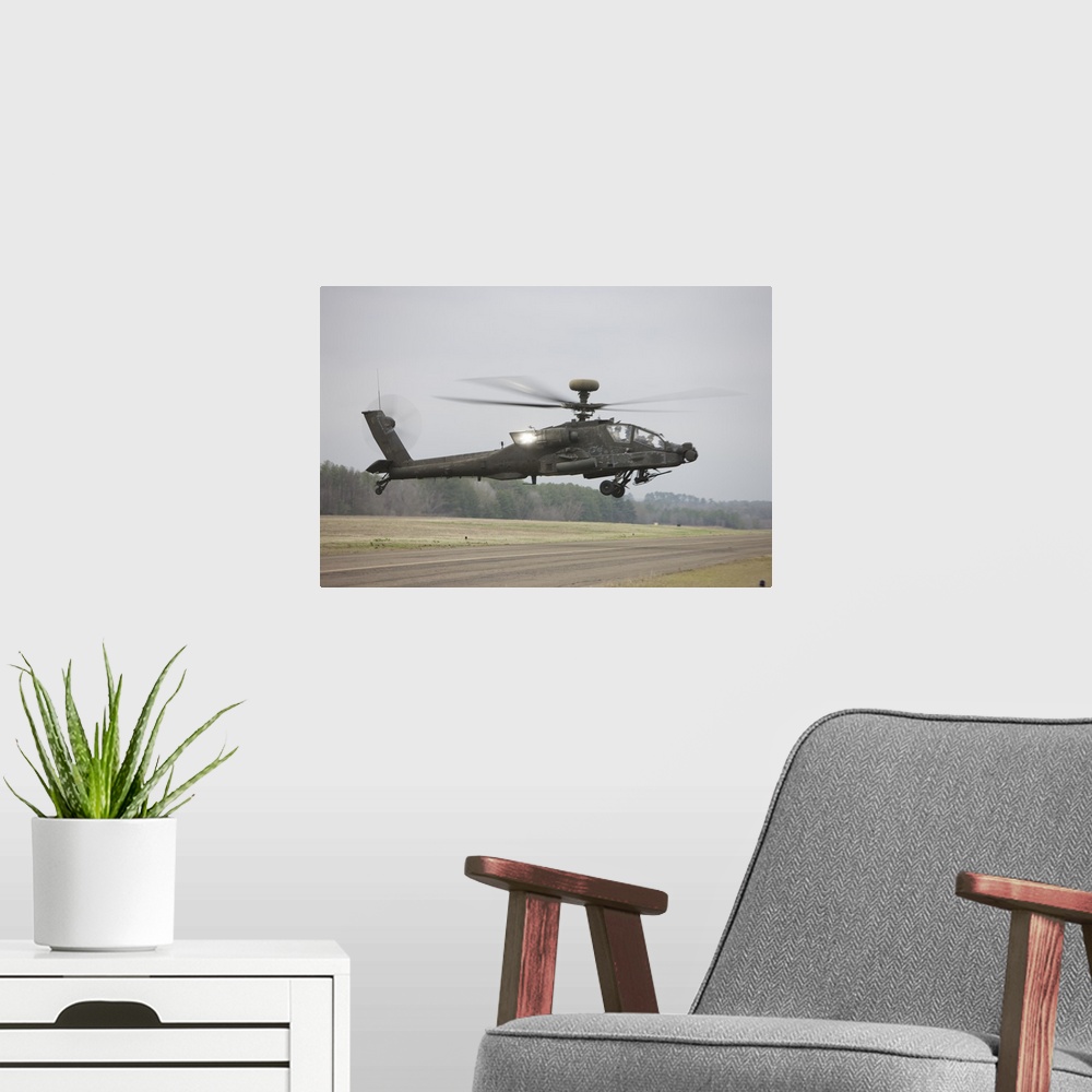 A modern room featuring An AH-64 Apache helicopter in midair, Conroe, Texas.
