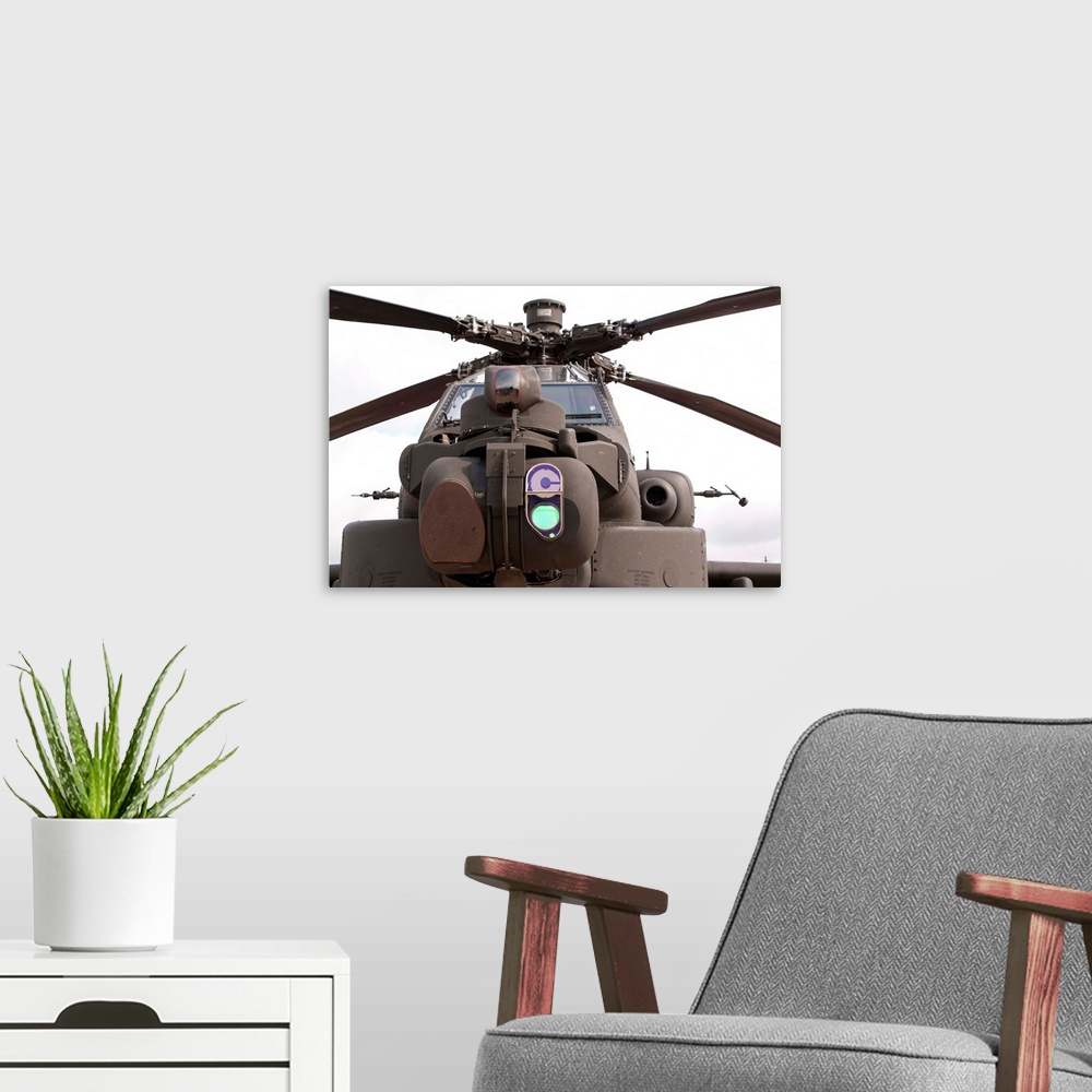 A modern room featuring An AH-64D Apache helicopter of the Royal Air Force.