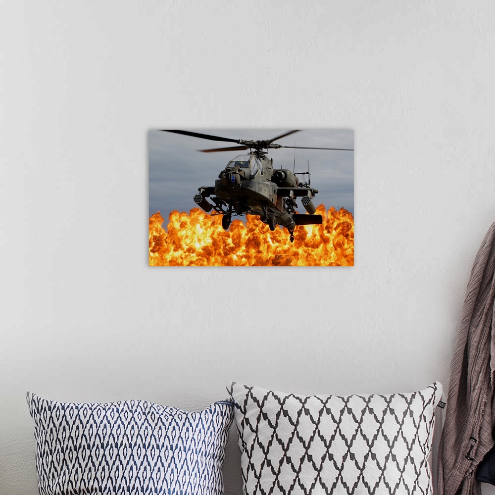A bohemian room featuring An AH-64D Apache Longbow during a combined arms demonstration.