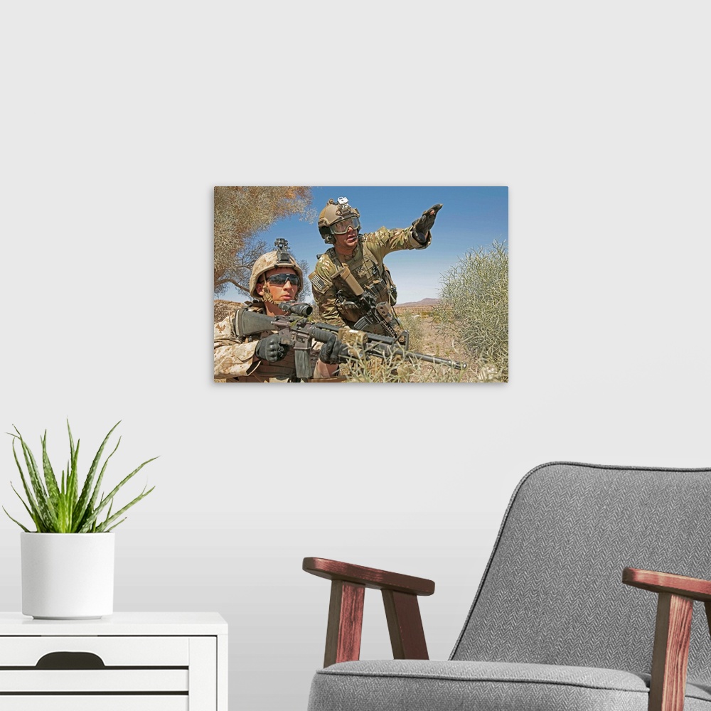 A modern room featuring An Army soldier informs a Marine on the current situation while providing security.