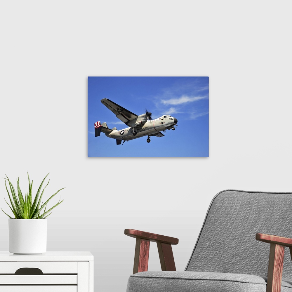 A modern room featuring An E-2C Greyhound flying over the South China Sea.