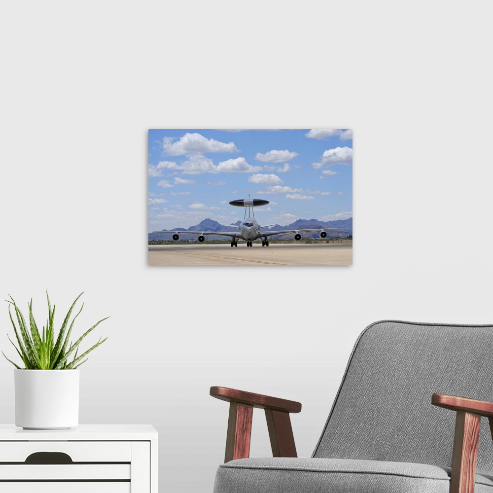 A modern room featuring An E-3 Sentry taxis on the flight line at Davis-Monthan Air Force Base, Arizona.