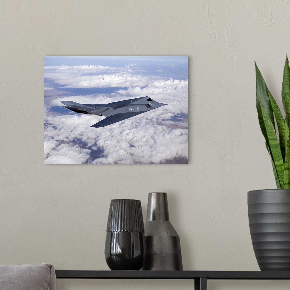 A modern room featuring An F-117 Nighthawk from the 53d Test and Evaluation Group's Detachment 1 flies a training sortie ...