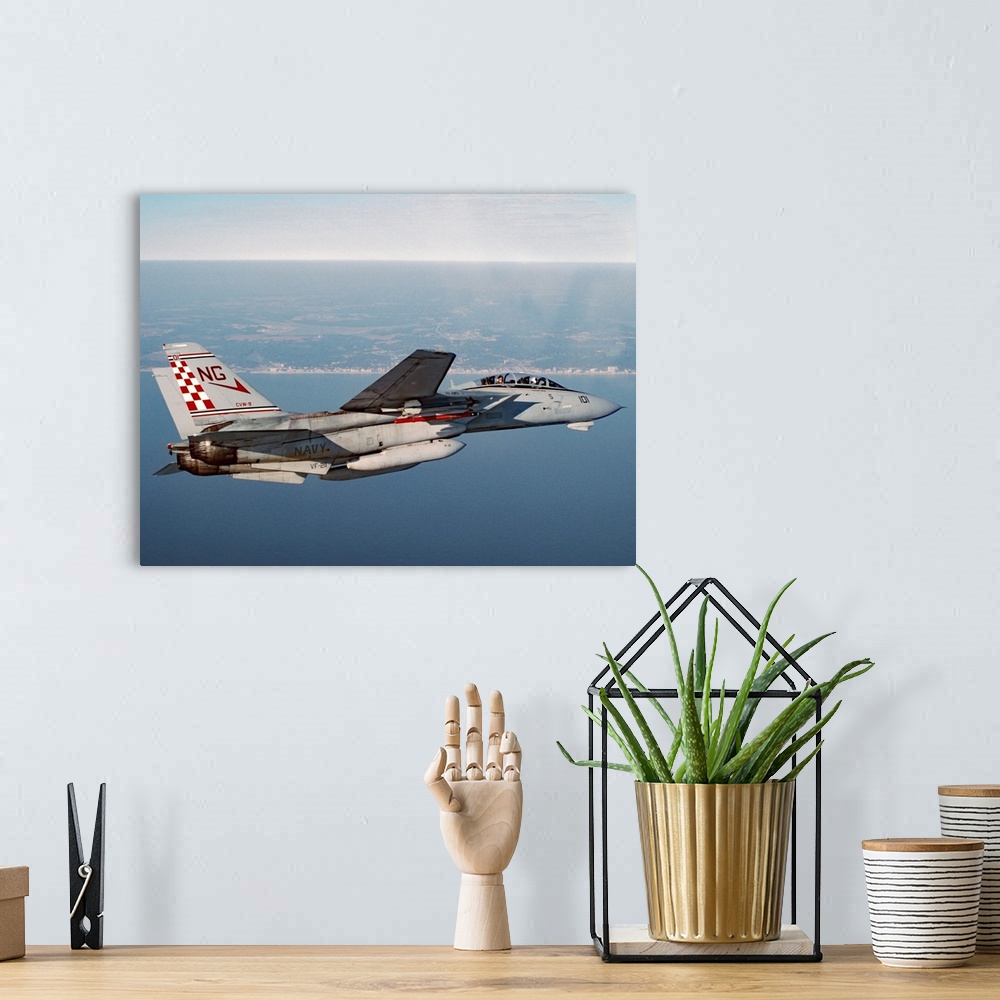 A bohemian room featuring An F-14A Tomcat of U.S. Navy Fighter Squadron 211 (VF-211, the Fighting Checkmates) cruises near ...