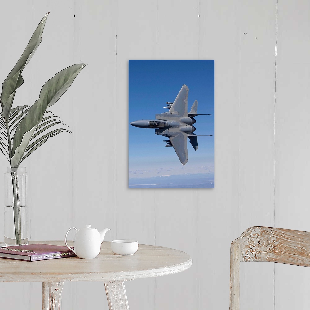 A farmhouse room featuring An F-15 Eagle from the 173rd Fighter Wing conducts air-to-air training over Central Oregon.
