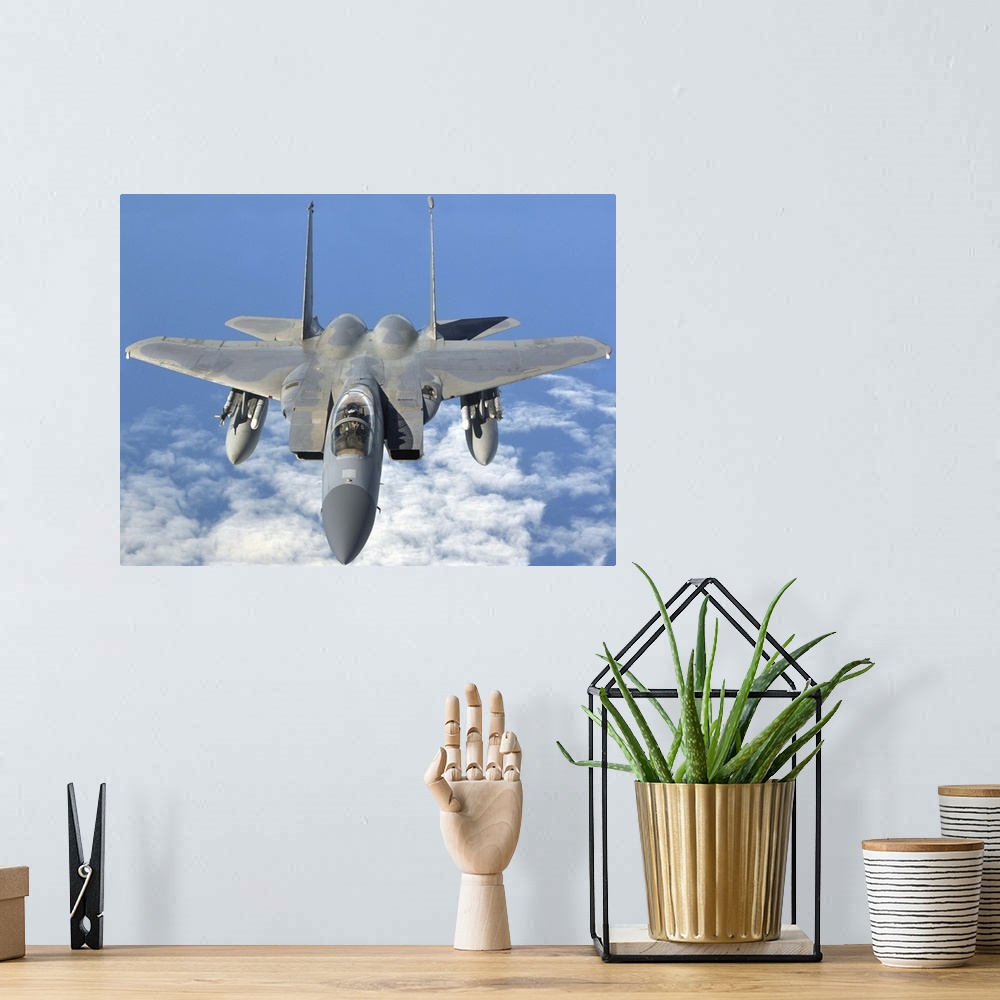A bohemian room featuring September 12, 2013 - An F-15C Eagle prepares to refuel with a KC-135R Stratotanker en route to th...