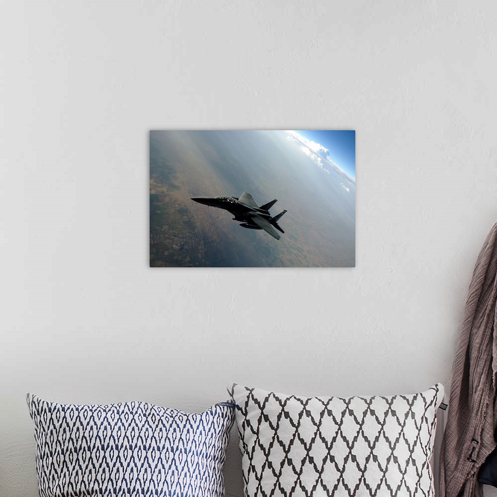 A bohemian room featuring An F-15E Strike Eagle breaks away from a KC-135 Stratotanker after refueling.
