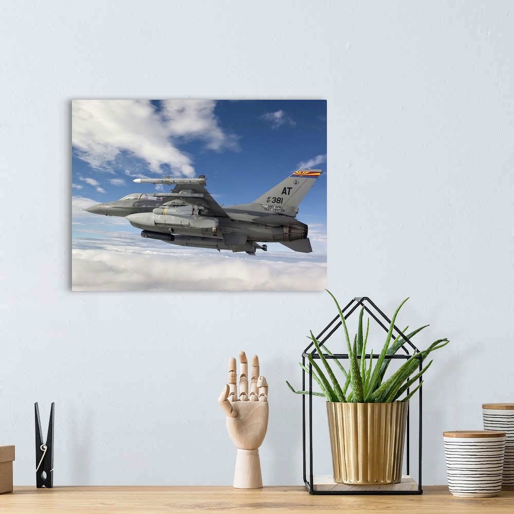 A bohemian room featuring An F-16 Fighting Falcon from the Air National Guard Air Force Reserve Test Center maneuvers with ...