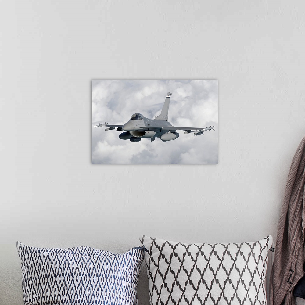 A bohemian room featuring An F-16 Fighting Falcon from the Colorado Air National Guard in flight over Brazil during Exercis...