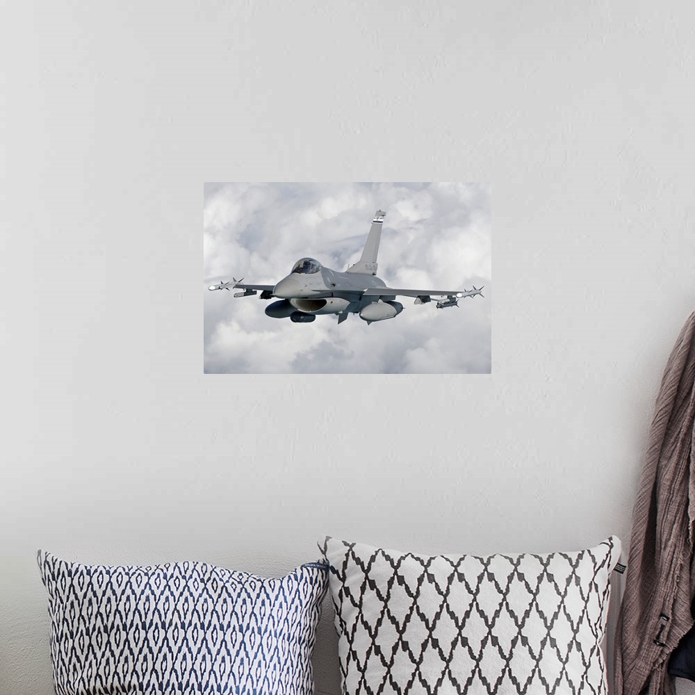 A bohemian room featuring An F-16 Fighting Falcon from the Colorado Air National Guard in flight over Brazil during Exercis...