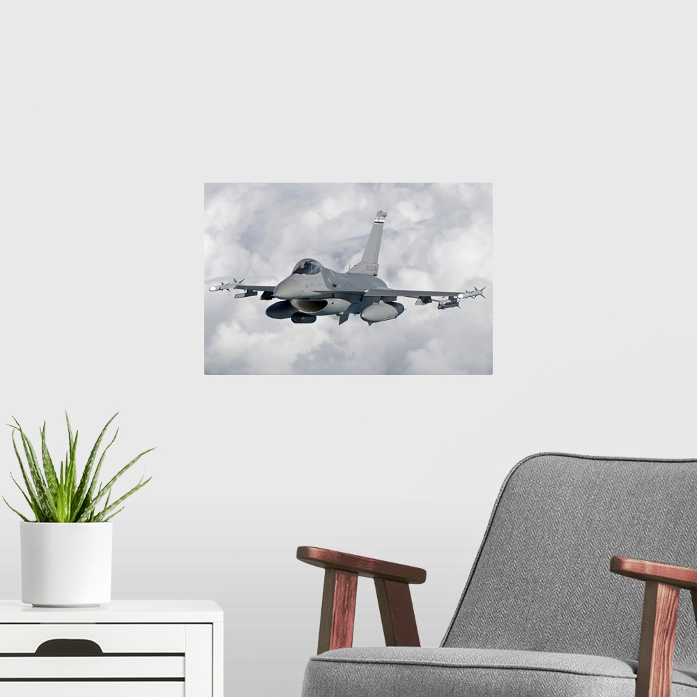 A modern room featuring An F-16 Fighting Falcon from the Colorado Air National Guard in flight over Brazil during Exercis...