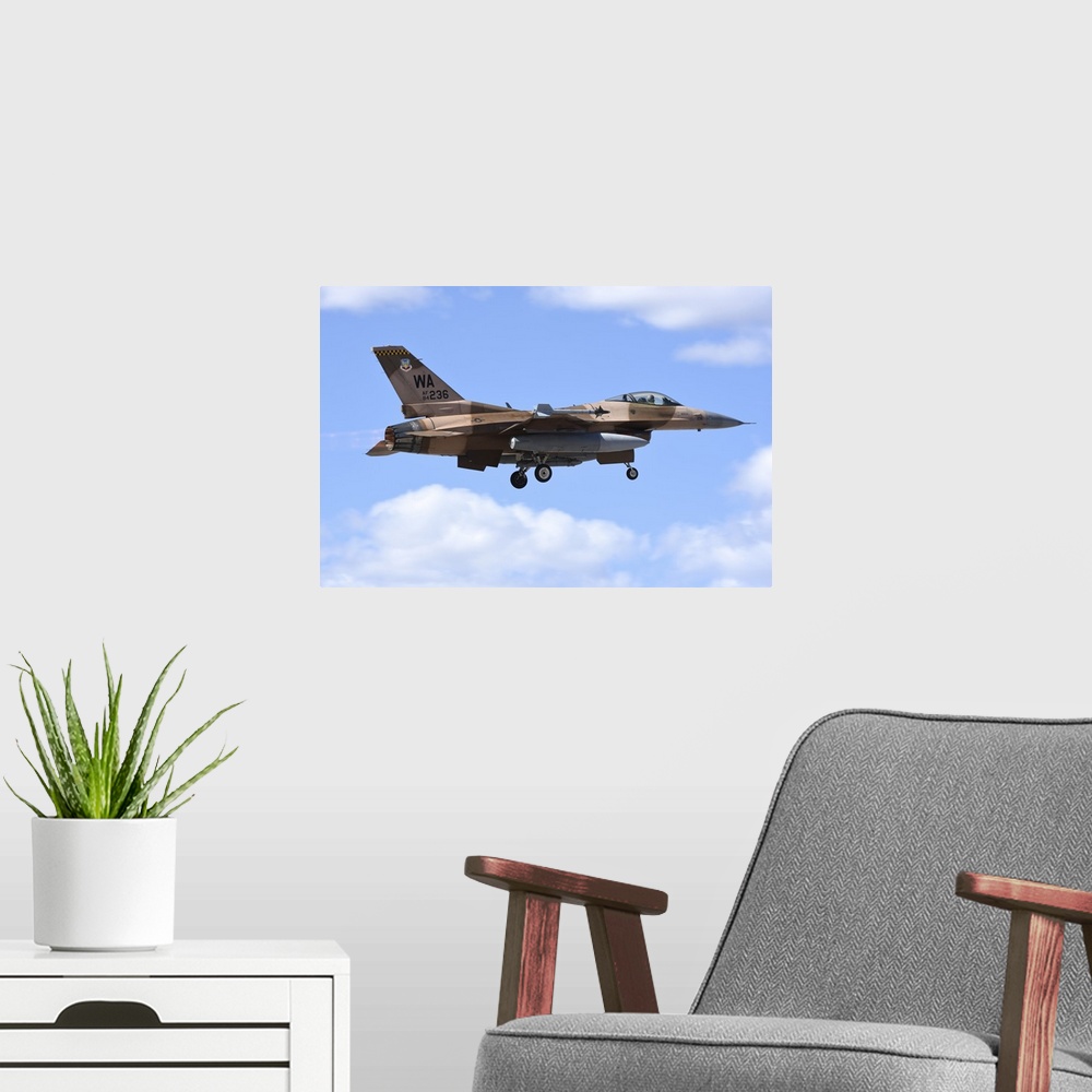 A modern room featuring An F-16C Fighting Falcon from 64th Aggressor Squadron of U.S. Air Force.