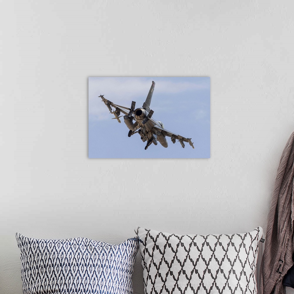 A bohemian room featuring An F-16C Fighting Falcon of the U.S. Air Force turns on to final approach at Nellis Air Force Bas...