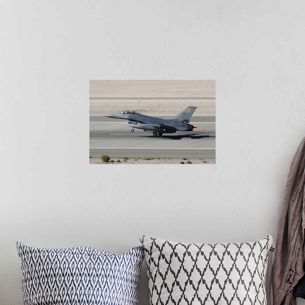 A bohemian room featuring An F-16C Fighting Falcon taking off from Nellis Air Force Base.