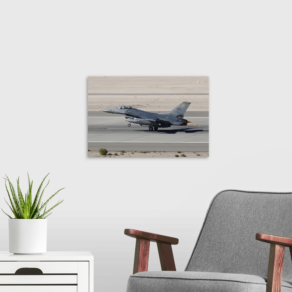 A modern room featuring An F-16C Fighting Falcon taking off from Nellis Air Force Base.