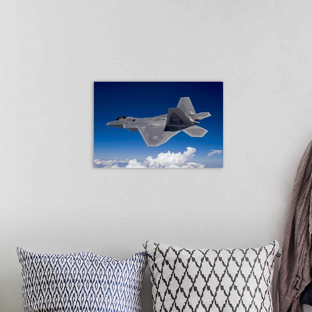A bohemian room featuring An F-22 Raptor flies around Southern New Mexico on a training mission out of Holloman Air Force B...