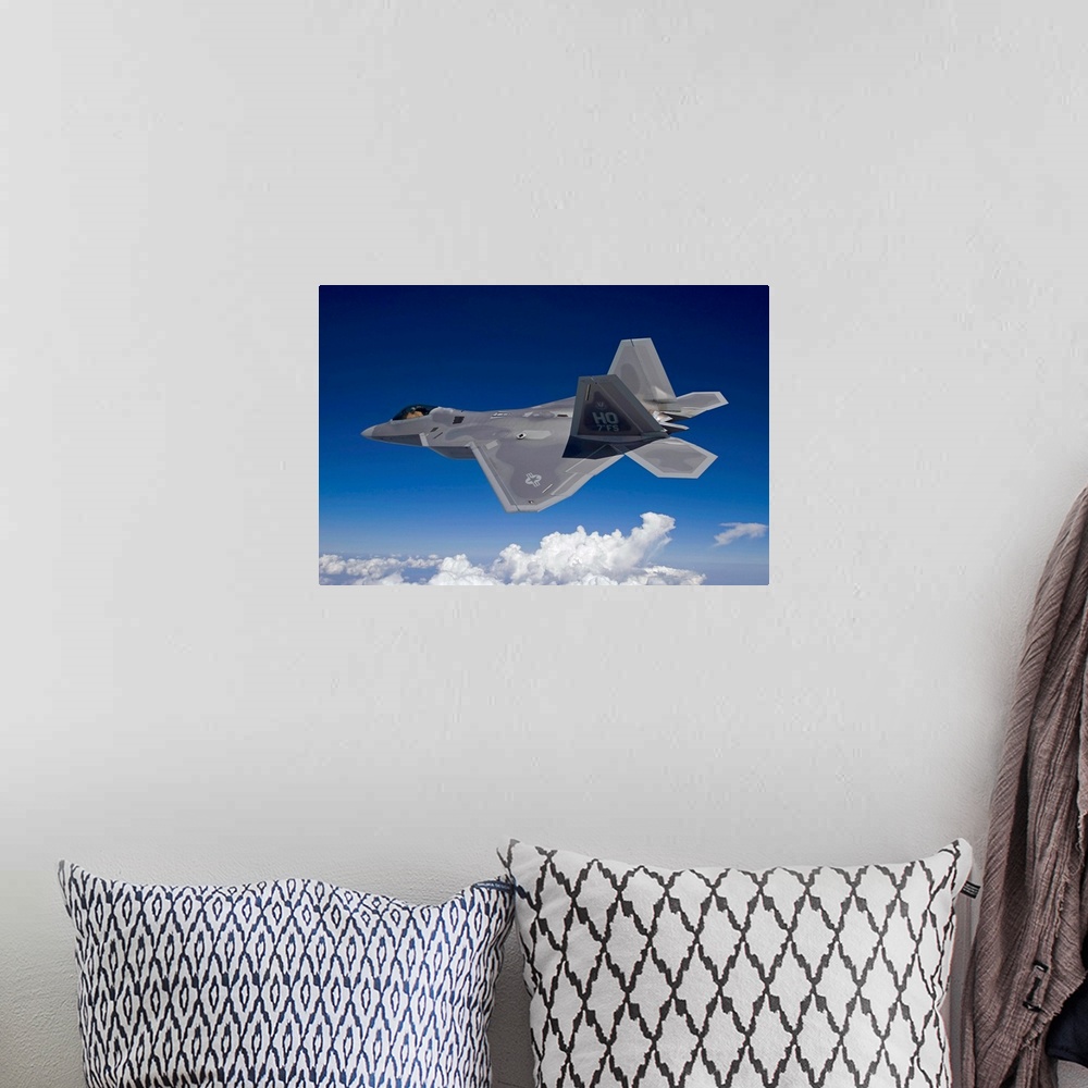 A bohemian room featuring An F-22 Raptor flies around Southern New Mexico on a training mission out of Holloman Air Force B...
