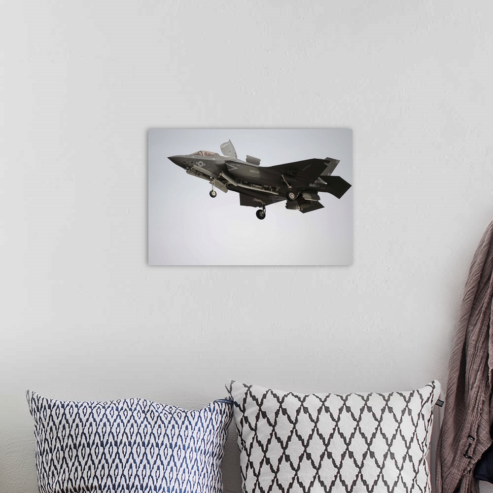 A bohemian room featuring March 21, 2013 - An F-35B Lightning II Joint Strike Fighter prepares to make a vertical landing a...