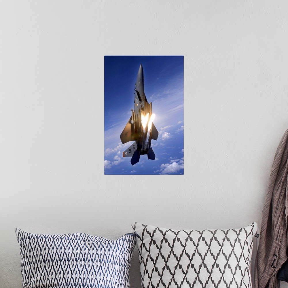 A bohemian room featuring Vertical panoramic of American all-weather multirole fighter launching flares as it travels upwar...