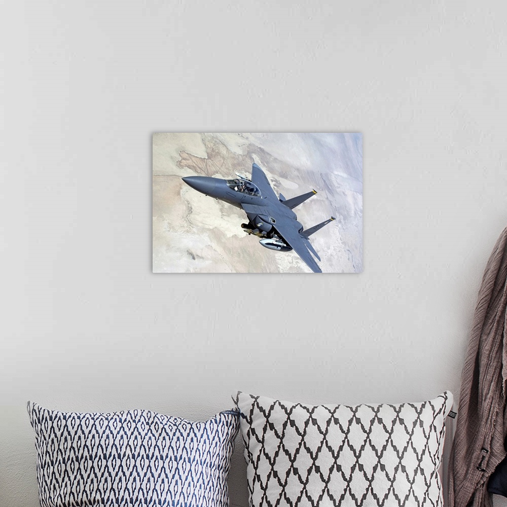 A bohemian room featuring An F15E Strike Eagle turns away after recieving fuel