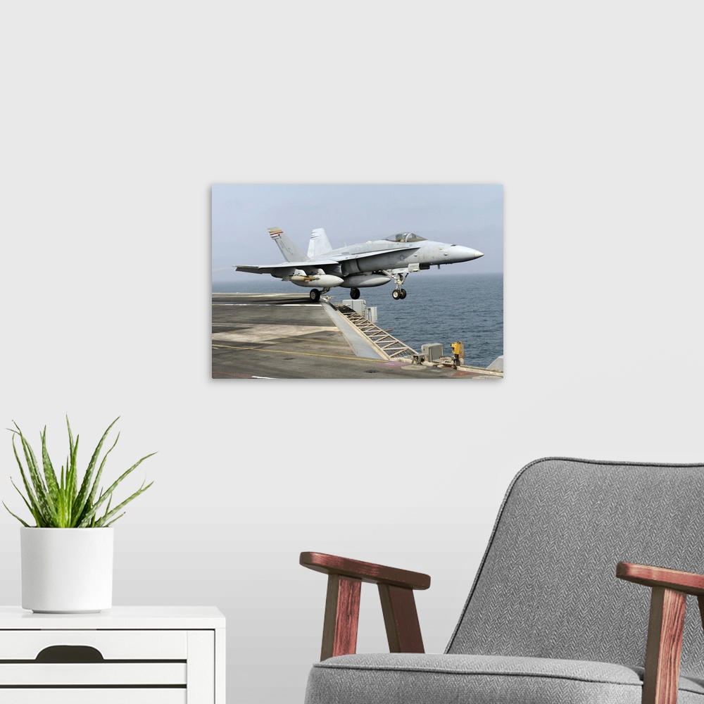 A modern room featuring Arabian Sea, September 17, 2010 - An F/A-18C Hornet launches from the aircraft carrier USS Harry ...