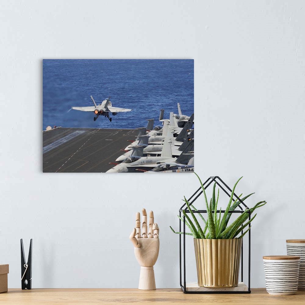 A bohemian room featuring North Arabian Sea, June 5, 2013 - An F/A-18C Hornet launches off the flight deck of the aircraft ...