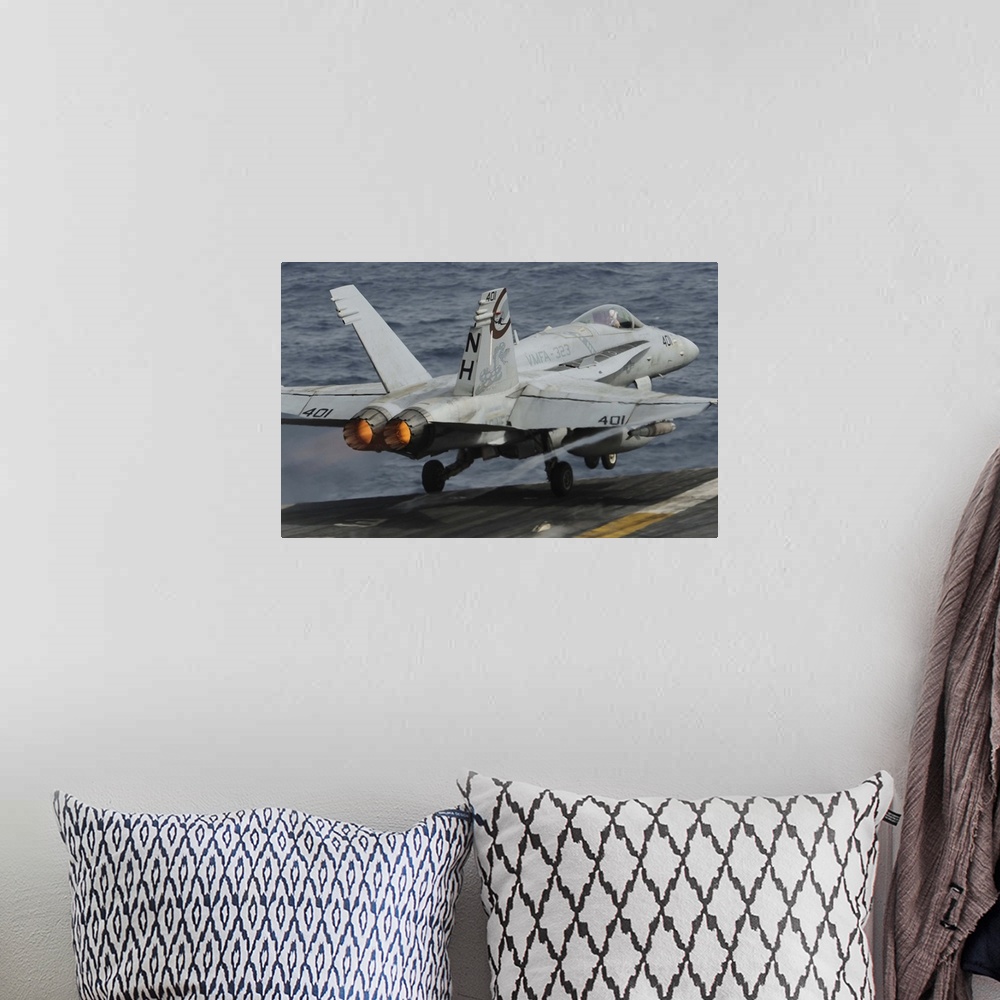 A bohemian room featuring Gulf of Oman, July 1, 2013 - An F/A-18C Hornet launches off the flight deck of the aircraft carri...